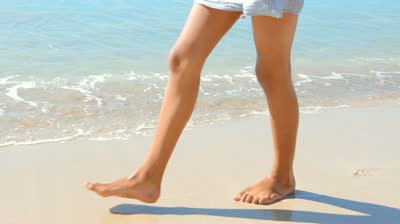 feet on a beach